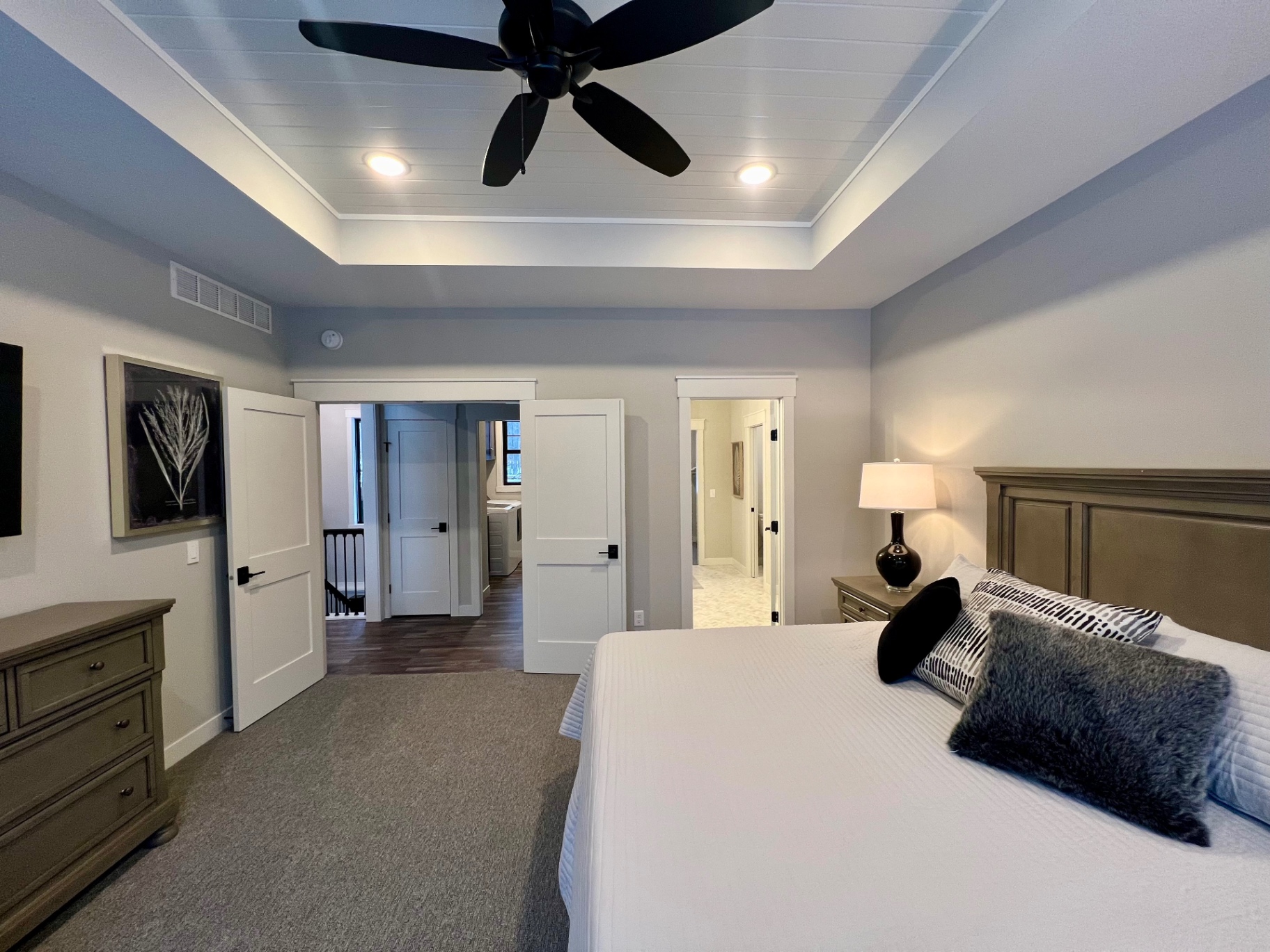 Tray-ceiling suite opening to the hall.